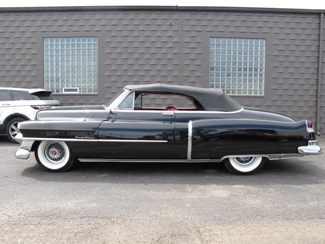 older repaint 1953 Cadillac Series 62 Convertible