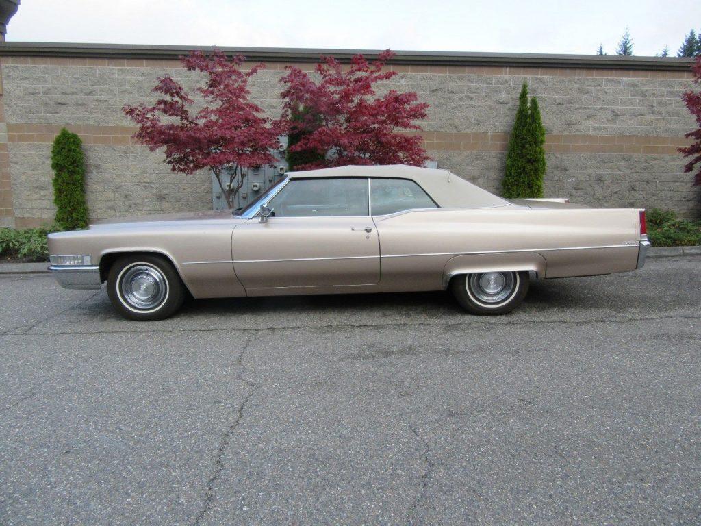 garaged 1969 Cadillac Deville Coupe Convertible